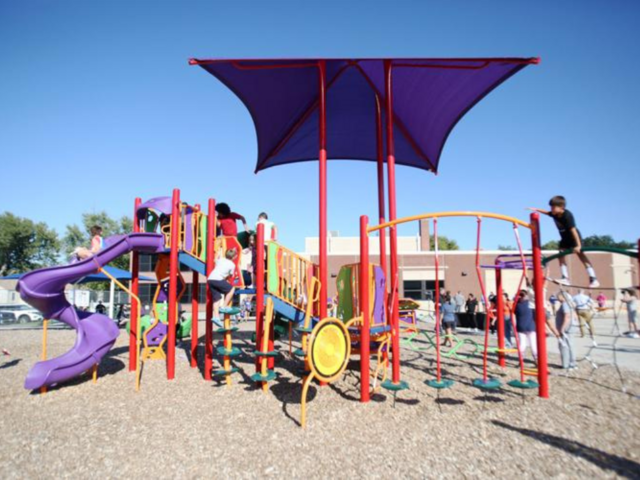 Community celebrates playground upgrades at Alcott image